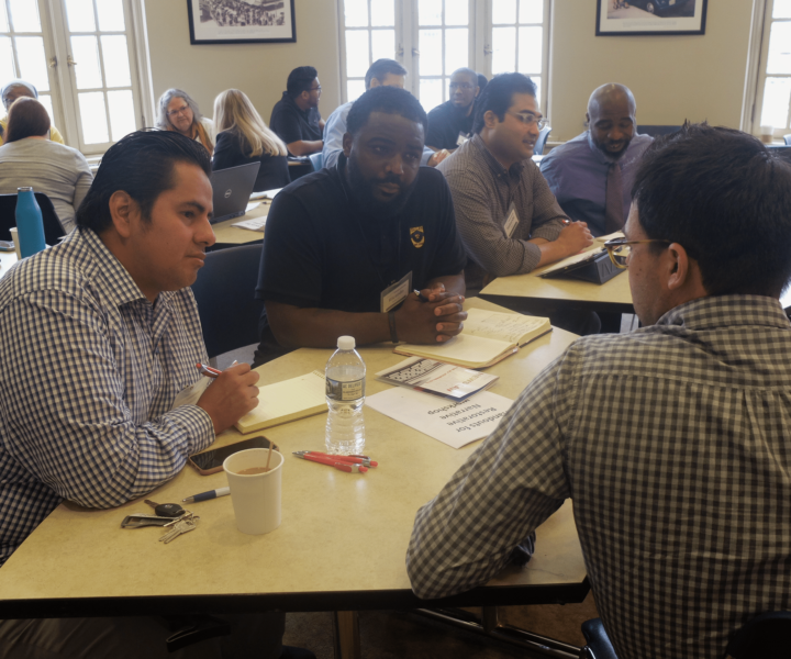Participants discuss restorative narrative stories during a small group exercise at a workshop in Atlantic City on Sept. 20, 2018. 